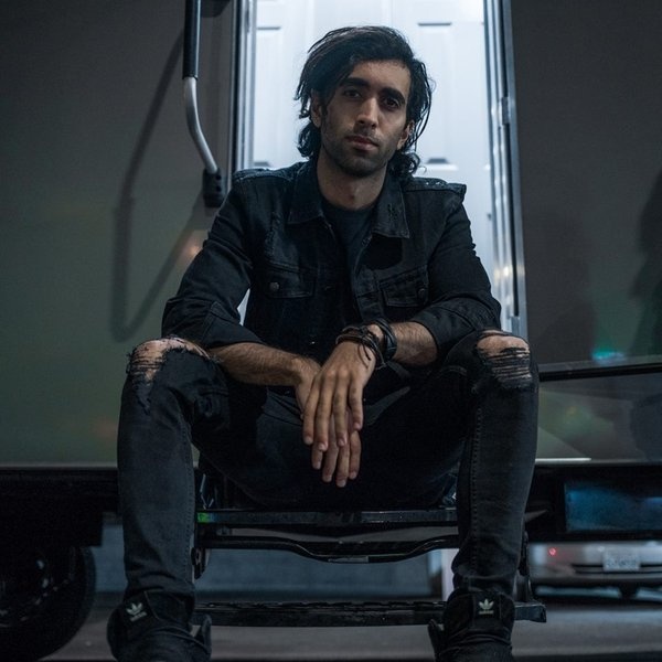 Unlike Pluto artist photo